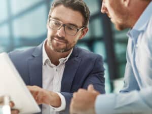 Leader presenting ideas on tablet